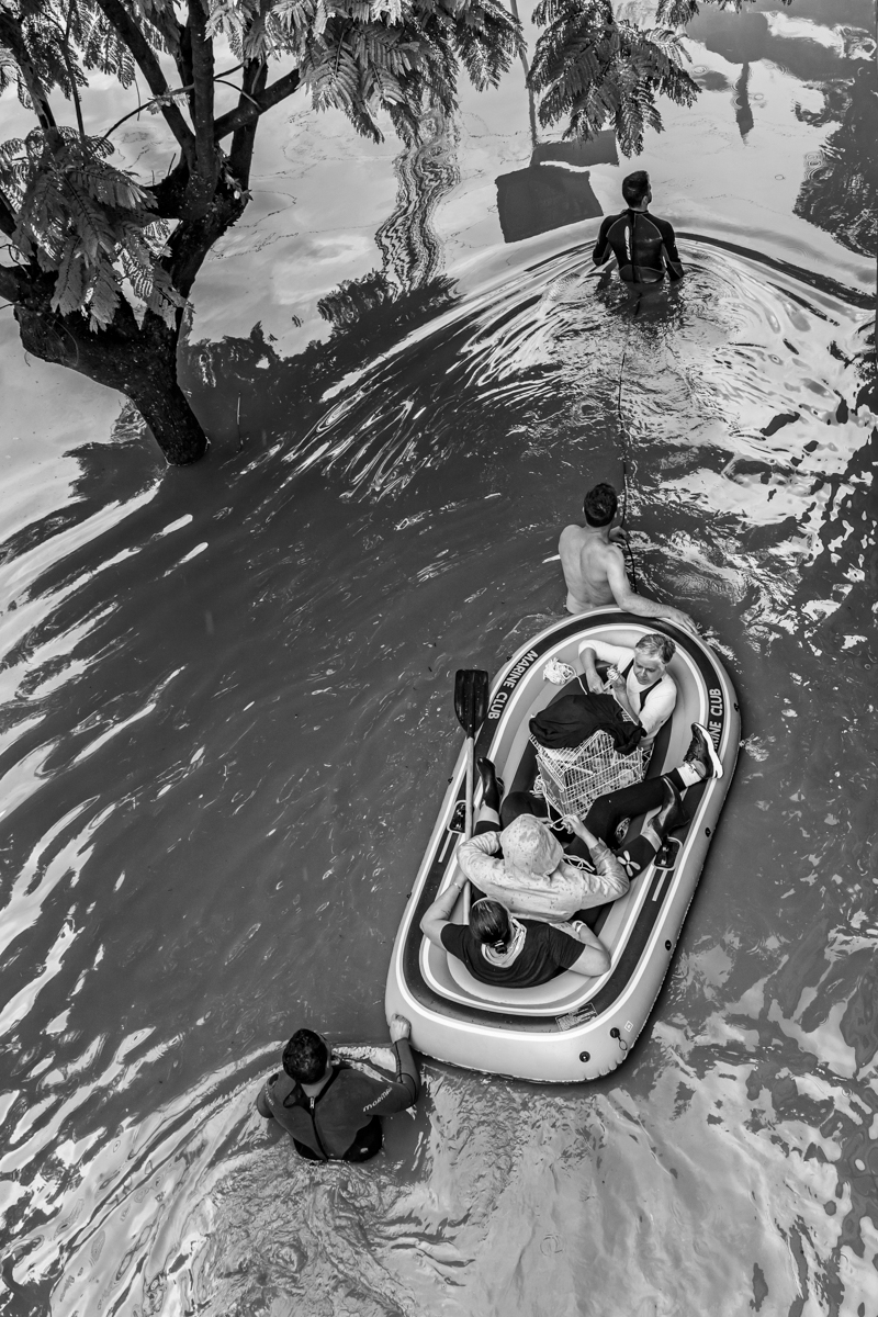 The force of water in a flooded city.