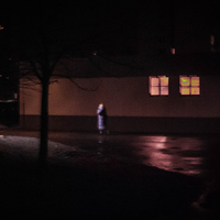 walking and smoking a cigarette