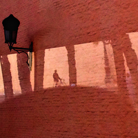 Riding a bike on the walls of Marrakech