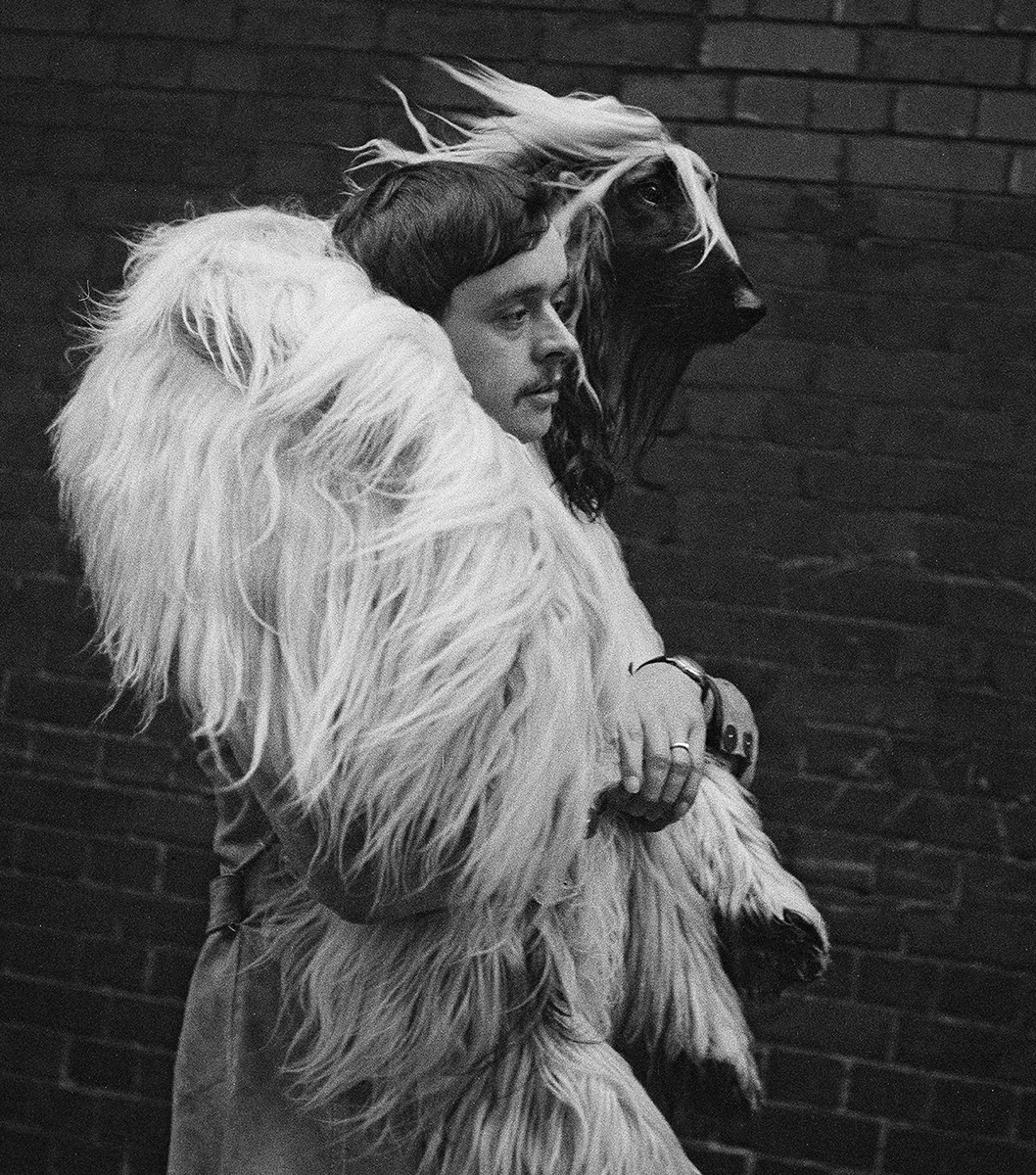 'Man Carrying Afghan'