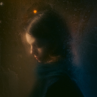 A street portrait from a bus stop.