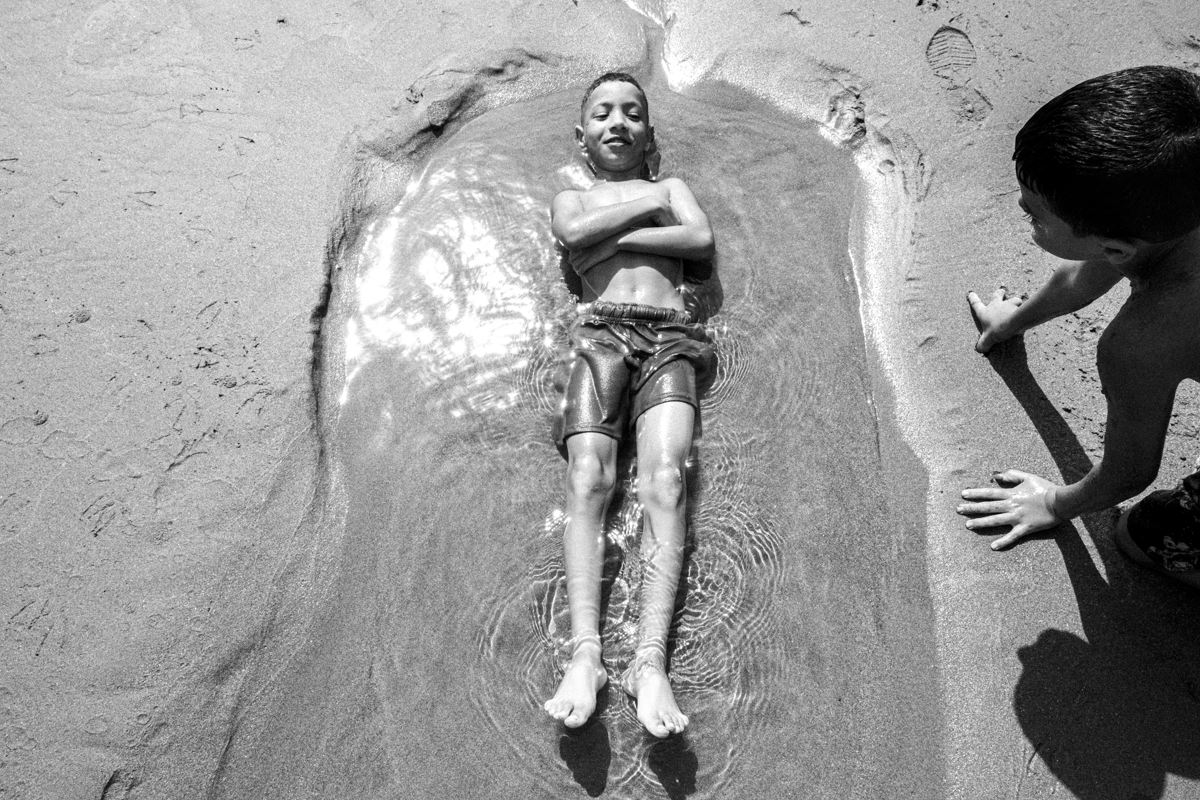 Children play at beach