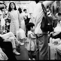 In Transit: Between Strangers and History