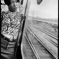 In Transit: Between Strangers and History