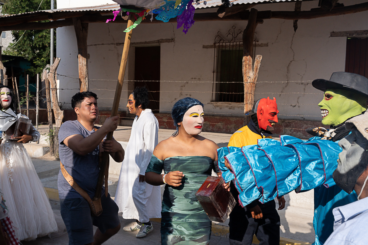 When the Masks Walk the Hills