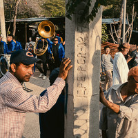 When the Masks Walk the Hills
