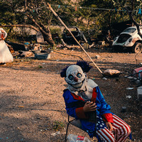 When the Masks Walk the Hills