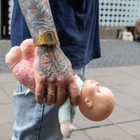 Tattoos and doll