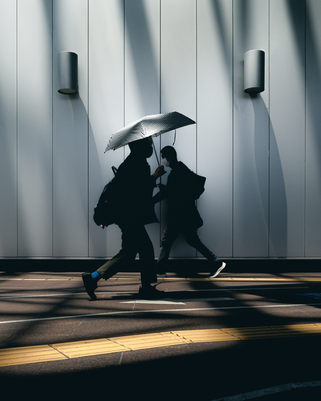 Sharing an umbrella