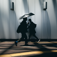 Sharing an umbrella