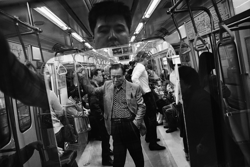 Reflections Inside the Seoul Metro