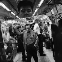 Reflections Inside the Seoul Metro