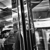 Reflections Inside the Seoul Metro