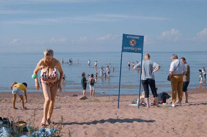 At the beach where swimming is prohibited