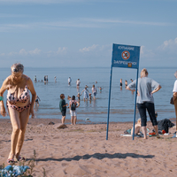 At the beach where swimming is prohibited