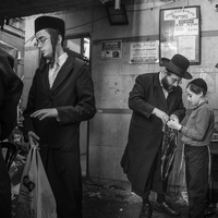 Father and son observe the Passover tradition