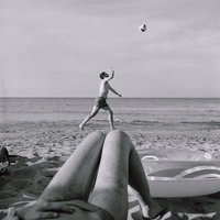 Man playing volley on the baeach, Torre Canne, Italy