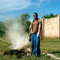 Kenyan man with Axe, Mombasa. 2024