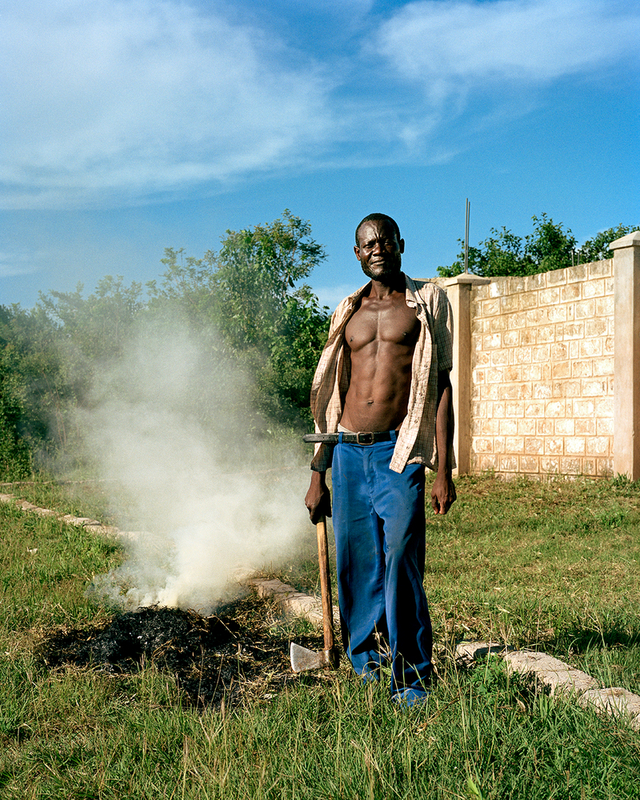 Kenyan man with Axe, Mombasa. 2024